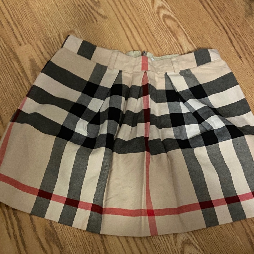 Kids Burberry A-Line Skirt in Black, Cream, and Pink Plaid
Used like new.